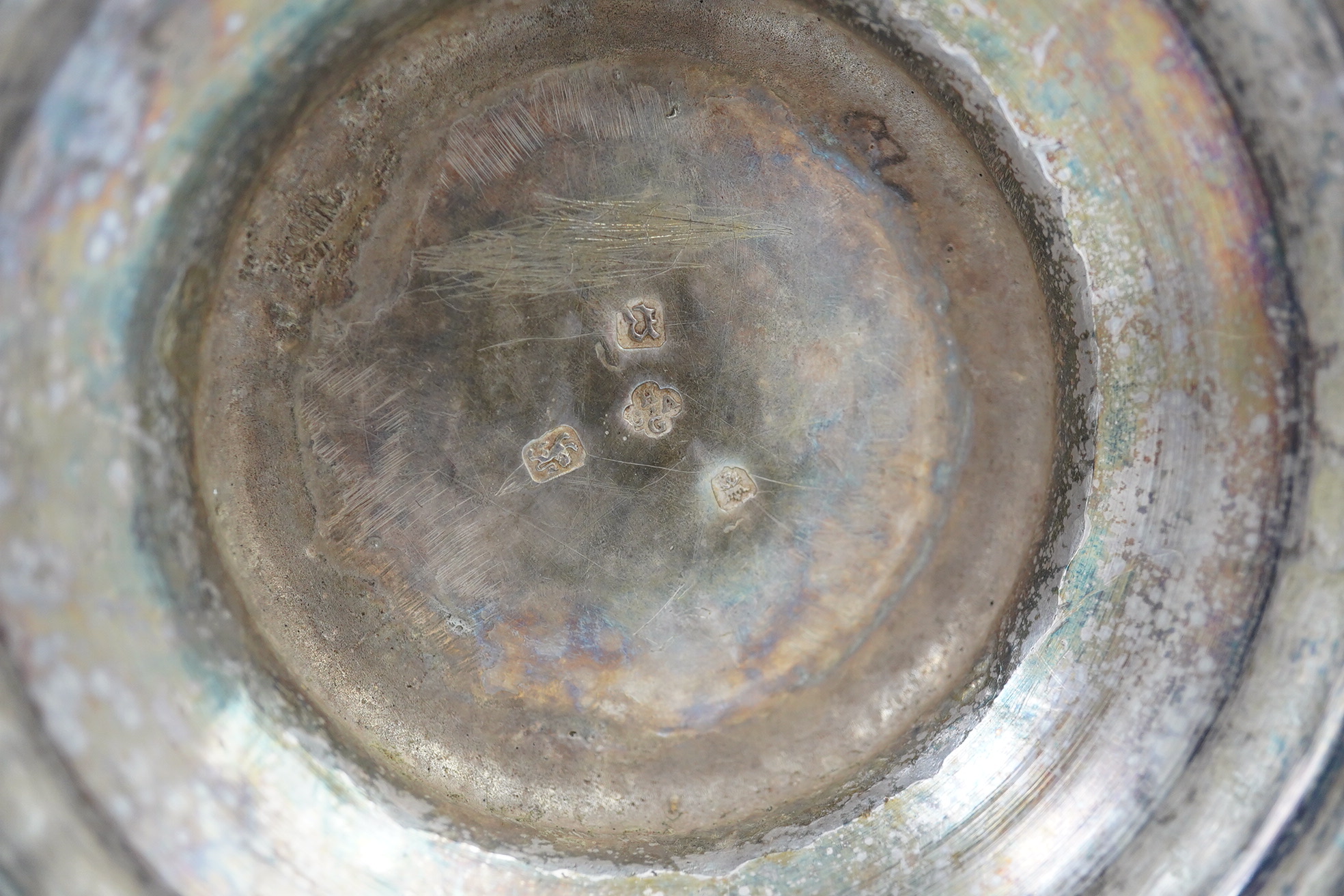 A George III silver coffee pot, by Aldridge & Green, with later embossed decoration